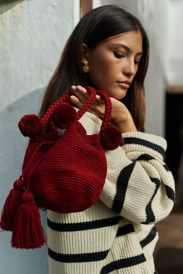 hand woven artisan red pom pom bag