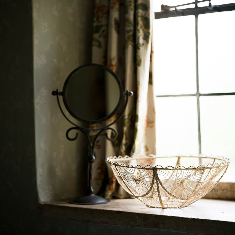 Hand woven raffia bowl with frill edge